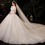 French Light Wedding Dress 2026 New Bridal Temperament Elegant Word Shoulder Repair Slim Large Tail Small Main Yarn HZ0517