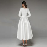 Temperament Evening Dress Woman 2026 New Banquet White Simple Long-Sleeved Travel Style Dress HZ0517