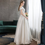 One-Word Shoulder-Sand-Faced Light Wedding Dress 2026 New Bride White Simple To Go Out Yarn Small Trip Wedding Dress HZ0517