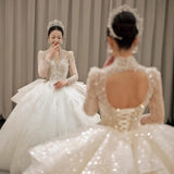 Long-Sleeved Wedding Dress 2026 New Bridal Heavy Industry Big Tail French Small Starry Sky Deep V Court Style Wedding Dress HZ0517