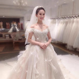 The Main Wedding Dress 2026 Spring New Bride A Word Shoulder Temperament Small Tailer Dream Super Fairy Go Out Yarn HZ0517